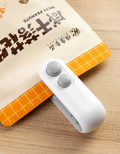 2-in-1 Mini Handheld Bag Sealer with Cutter & Magnet